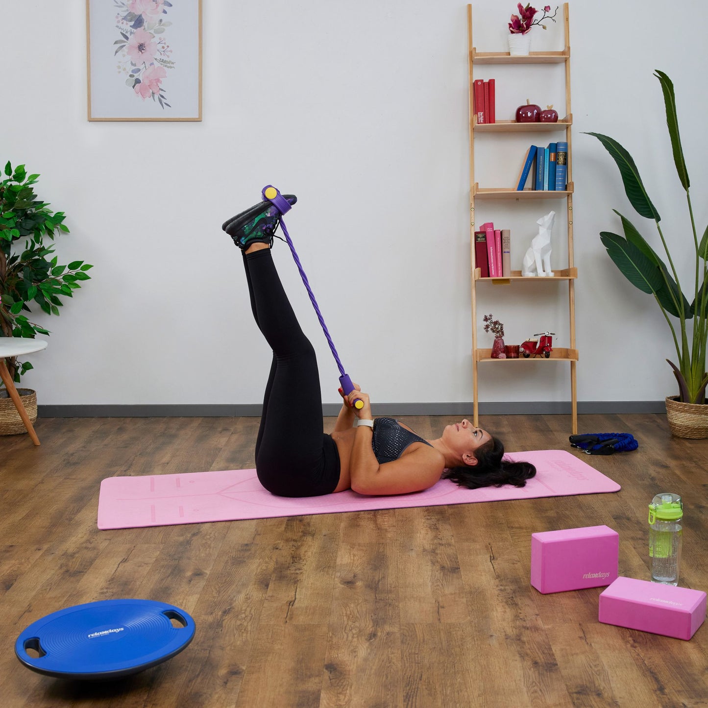 Multifunktionellt träningsband med fotloop för effektiv helkroppsträning