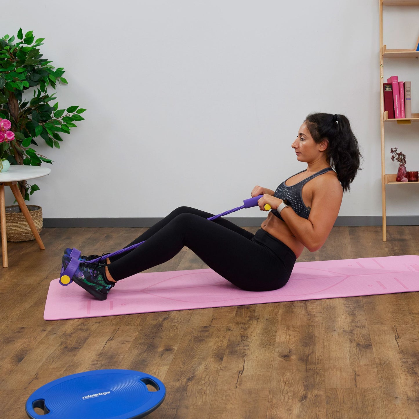 Multifunktionellt träningsband med fotloop för effektiv helkroppsträning